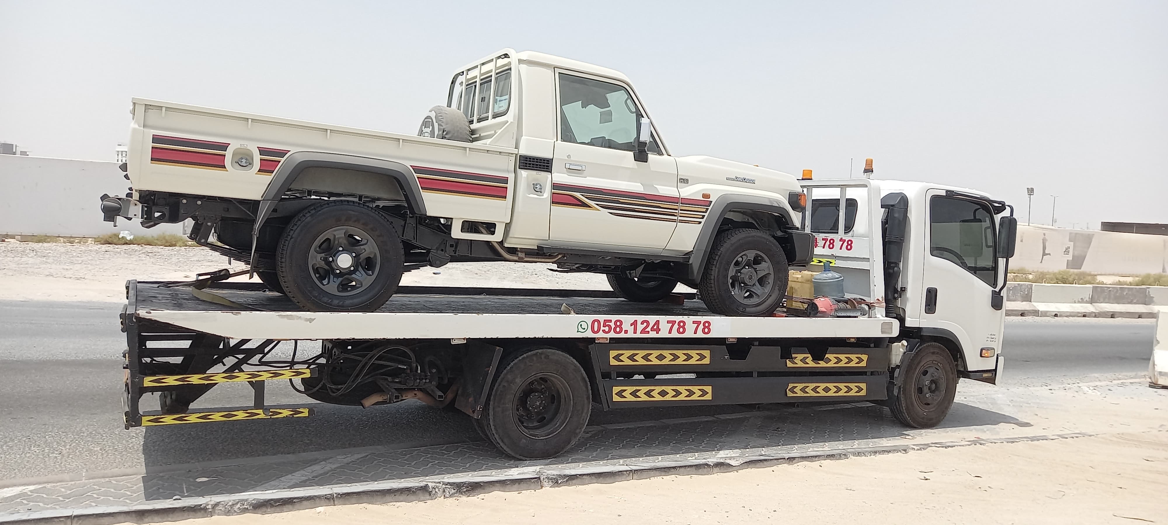 Flatbed towing Abu Dhabi